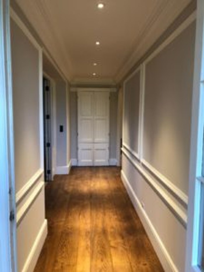 Original cornice and ceiling rose repainted by hand